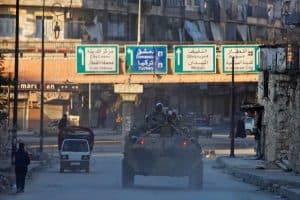 Russian soldiers, on armored vehicles, patrol a street in Aleppo, Syria February 2, 2017. REUTERS/Omar Sanadiki