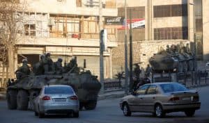 Russian soldiers, on armored vehicles, patrol a street in Aleppo, Syria February 2, 2017. REUTERS/Omar Sanadiki
